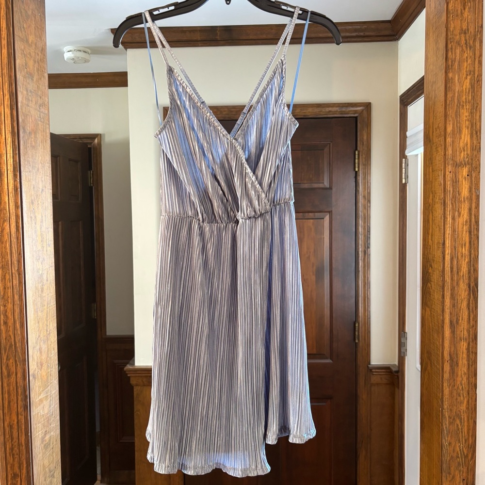 Light blue silk-like mini dress. Size small. Ripple detail.